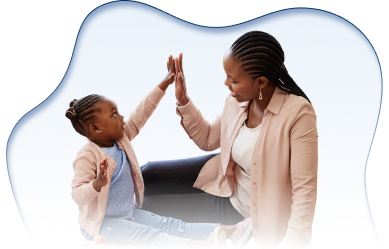 Speech therapist helping child with autism practice communication skills
