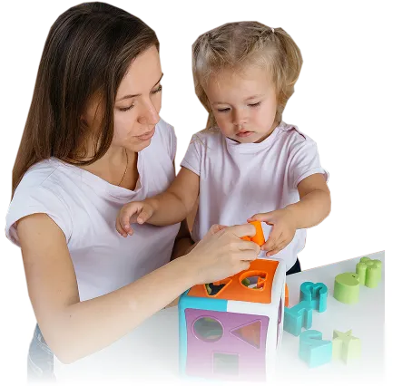 RBT working one-on-one with child during play-based therapy session